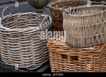 Selection of hand-made wicker log baskets. Stock Photo