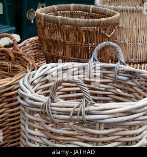 Selection of hand-made wicker log baskets. Stock Photo