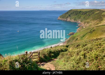 Overlooking the emerald sea at Lantic Bay, Cornwall, England. Stock Photo
