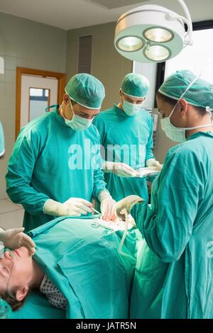 Female patient lying on operating table Stock Photo