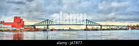 Panorama of Jacques Cartier Bridge crossing the Saint Lawrence River in Montreal, Canada