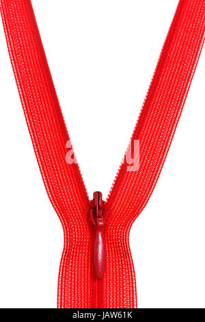 plastic red coil zip fastener close up isolated on white background Stock Photo