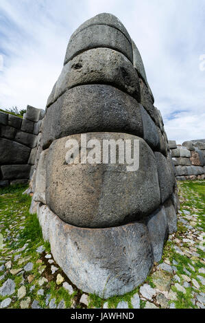 The Inca carved interlocking dry-stone walls from boulders to build a citadel terrace wall. Stock Photo