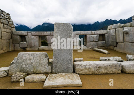 The Temple of the Three windows is a sacred structure in the Inca ruins at Macchu Picchu. Stock Photo