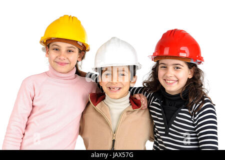 Group of children posing with protective helmets isolated in white Stock Photo