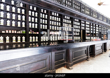 Porcelain jars with medicines and herbs in old pharmacy cabinet of drugstore in the Calle Obispo, Havana, Cuban pharmacy, Havana pharmacy Stock Photo