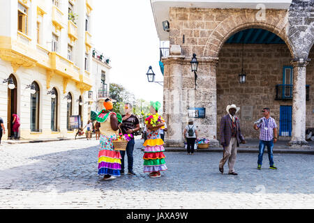 Cuban woman wearing traditional costume in the Plaza de la Catedral, Old Havana, Havana, Cuba, Cuban woman traditional dress Stock Photo