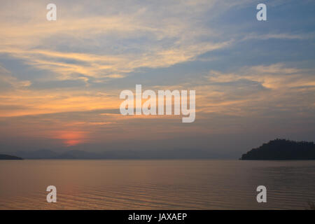 Sunset at lake, Kaeng Krachan Dam, Kaengkrachan National Park Thailand Stock Photo