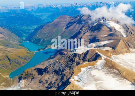 Kaprun reservoir lake and surrounding Grossglockner mountain range aerial view, Salzburg, Austria Stock Photo