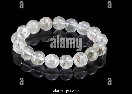 Crystal stone bracelet  in a black background Stock Photo