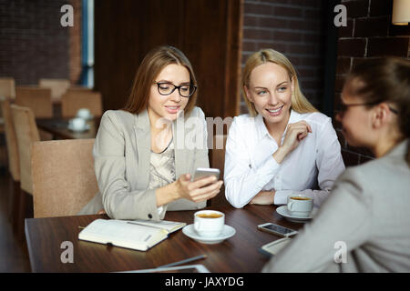 Attractive Businesswomen Having Coffee Break Stock Photo