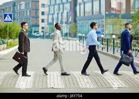 Crossing Road in City Center Stock Photo