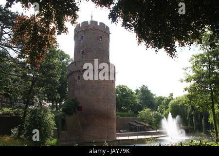 Kronenburgerpark in centre of Nijmegen, Netherlands, with 30m high Kruittoren (1426), part of the former medieval city ramparts Stock Photo
