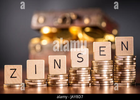 Stack of coins and the word interest. Stock Photo