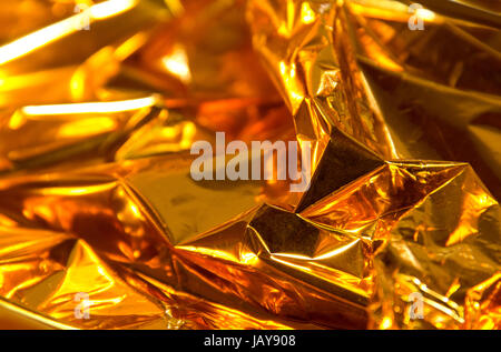 full frame creased gold foil background Stock Photo