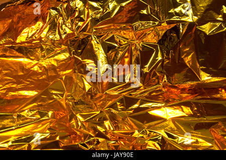 full frame creased gold foil background Stock Photo