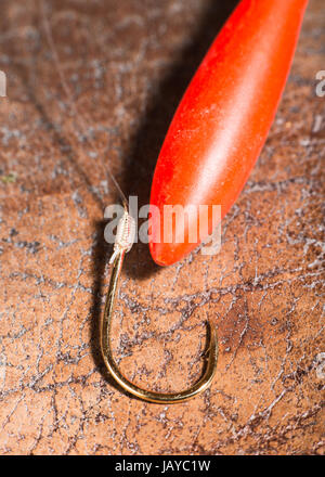 Hooks for fishing and float. Macro shot. Natural look Stock Photo