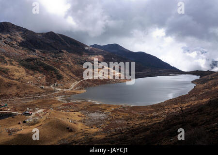 Lake under cloudy sky Stock Photo