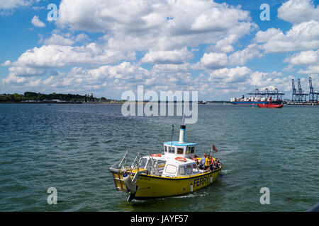 Harwich Harbour Ferry vessel, Harwich waterfront, and Felixstowe container port, Harwich Essex England Stock Photo