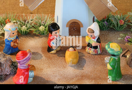 Dutch nativity scene with Holland windmill and the Three Kings who bring gifts Stock Photo