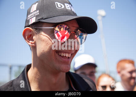 Montreal, Canada. 8th Jun, 2017. French race driver Esteban Ocon signing autographs on the Gilles Villeneuve circuit in Montreal ahead of the Canadian Formula One Grand Prix. Credit: Cristian Mijea/Alamy Live News Stock Photo