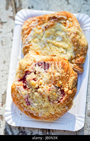 Fresh pastry with strawberries and cheese on white background Stock Photo