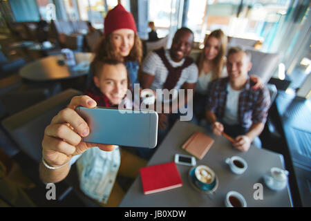 Taking Selfie in Coffeehouse Stock Photo