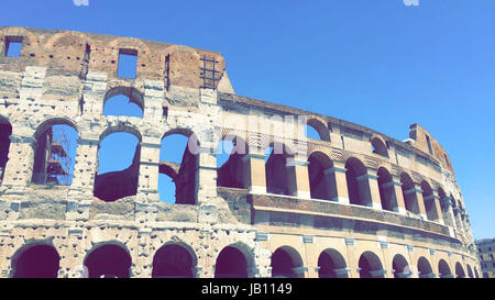 A photograph of the curved outside of the home of the gladiators -  Colosseum in Rome, Italy Stock Photo