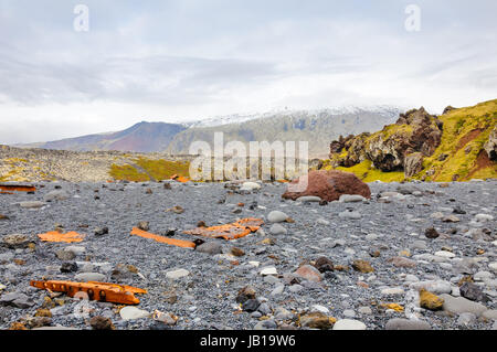 Remains of a boat wreck at the black beach on Iceland Snaefellsnes Dritvik Stock Photo