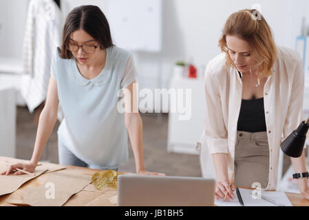 Tailors working together on a common project Stock Photo