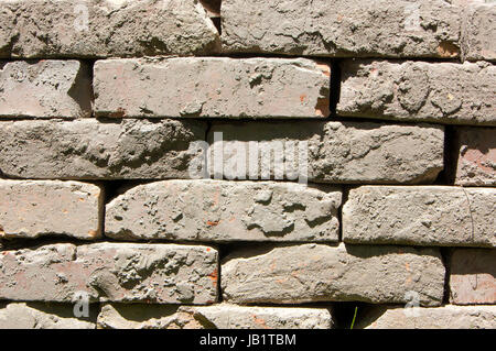 A wall of stacked bricks. Close up, macro. Stock Photo
