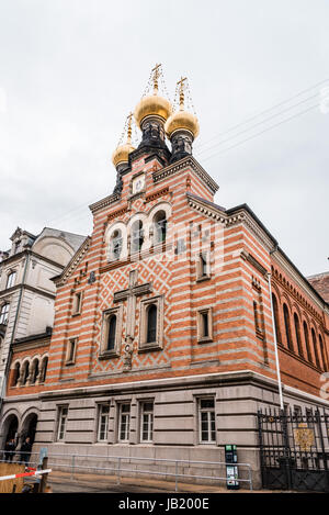 Copenhagen, Denmark - August 10, 2016. The Russian Church in Copenhagen. Low angle view against overcast sky. The exterior of the church is dominated  Stock Photo