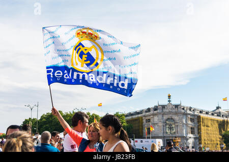 Madrid, Spain - june 04, 2017. Hundreds of people gather in front of the city hall of Madrid to celebrate the victory in the league of the Real Madrid
