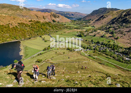 Walkers climbing Hartsop Dodd  in the Lake District national park Stock Photo