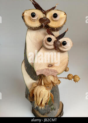 Family of owls on wood Stock Photo