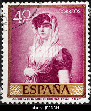 SPAIN - CIRCA 1958: A postage stamp printed in the Spain shows Goya painting Young Lady Wearing a Mantilla and Basquina, circa 1958 Stock Photo