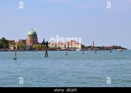 View of  the Island Lido di Venezia with San Elisabetta church, church San Nicolo and the landing stage for boats from Venice. Lagoon of Venice, Italy Stock Photo
