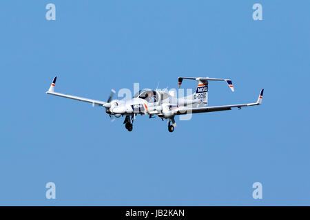 Diamond DA-42 MPP Guardian [G-DOSC] equipped with surveillance equipment landing runway 31. Stock Photo