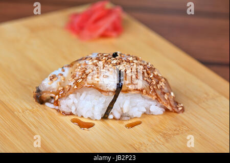 sushi unagi with sauced slice of smoked eel Stock Photo