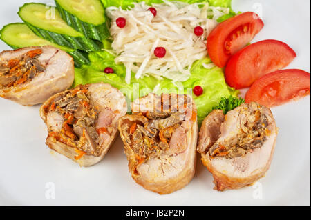 Chicken rolls with champignons and vegetables Stock Photo