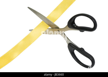 Grand Opening scissors cutting a golden ribbon Stock Photo
