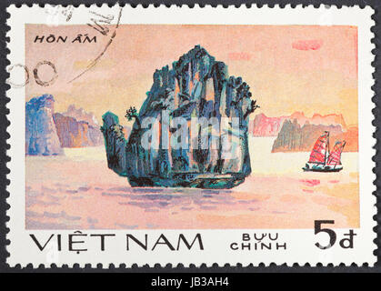 SOCIALIST REPUBLIC OF VIETNAM - CIRCA 1984: A postage stamp printed in the Vietnam shows natural scenery of UNESCO World Heritage island Hon Am at Ha Long bay, circa 1984 Stock Photo