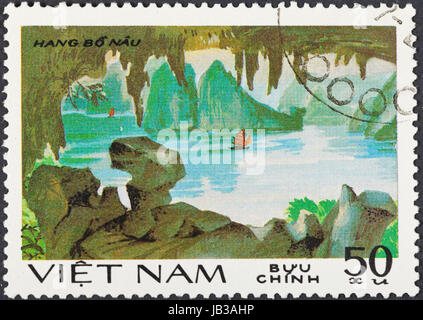SOCIALIST REPUBLIC OF VIETNAM - CIRCA 1984: A postage stamp printed in the Vietnam shows natural scenery of UNESCO World Heritage grotto Hang Bo Nau at Ha Long bay, circa 1984 Stock Photo