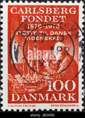 DENMARK - CIRCA 1976: A postage stamp printed in the Denmark shows Carlsberg Laboratory funded by Carlsberg foundation, circa 1976 Stock Photo