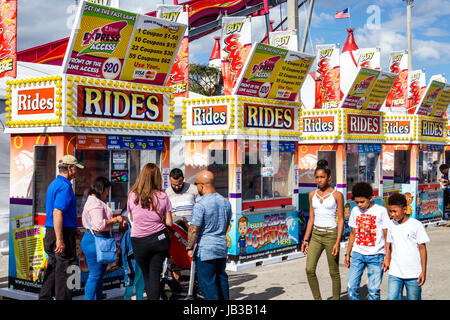 Miami Florida,Tamiami Park,Miami-Dade County Youth Fair & Exposition,county fair,carnival,midway,ticket sales,booth,rides,coupons,family families pare Stock Photo