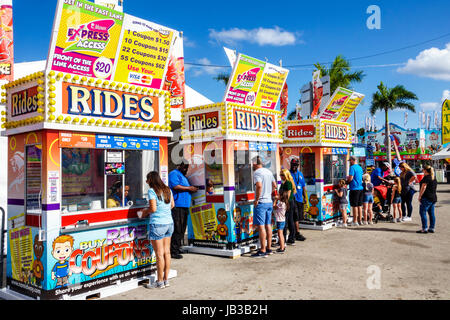 Miami Florida,Tamiami Park,Miami-Dade County Youth Fair & Exposition,county fair,carnival,midway,ticket sales,booth,rides,coupons,transaction paying p Stock Photo