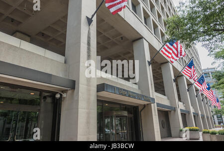 Federal Bureau of Investigation headquarters in Washington, DC. Sign over doorway.  Named the J. Edgar Hoover Building after the first FBI director. Stock Photo