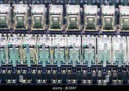Close up Relay actuators inside the Industrial power case Stock Photo