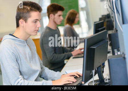 shot of young students sitting in a computer room Stock Photo