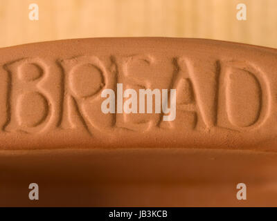 extreme close up of clay bread baking pan Stock Photo